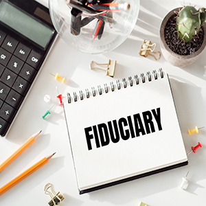 Notebook with FIDUCIARY on it, related to a Trustee failing duties in New York trust litigation.